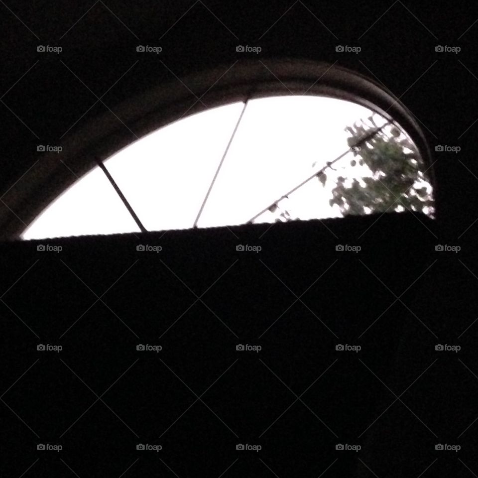 Nighttime, brightness from flash of lightning during a thunderstorm, my bedroom window