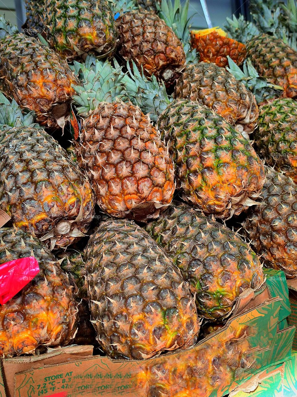Spring market. Ripe pineapples