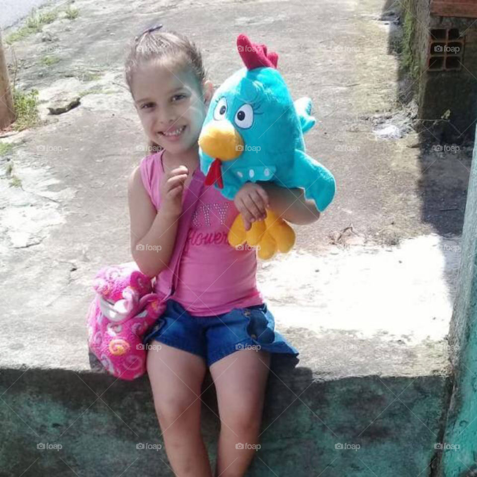 Baby Girl with Toy in Brazil 