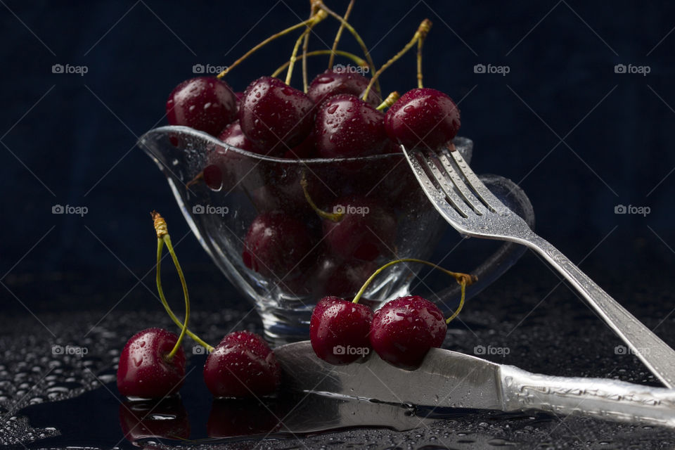 cherry background.  sweet,  ripe berries on  dark background