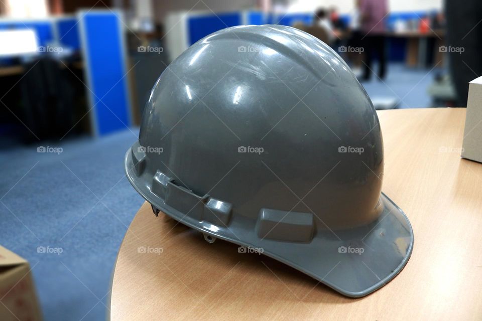 Grey safety helmet for workets to protect their head