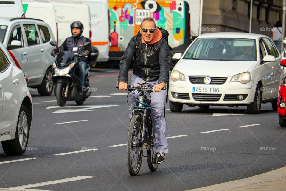 Street cyclist on the street of Madrid city