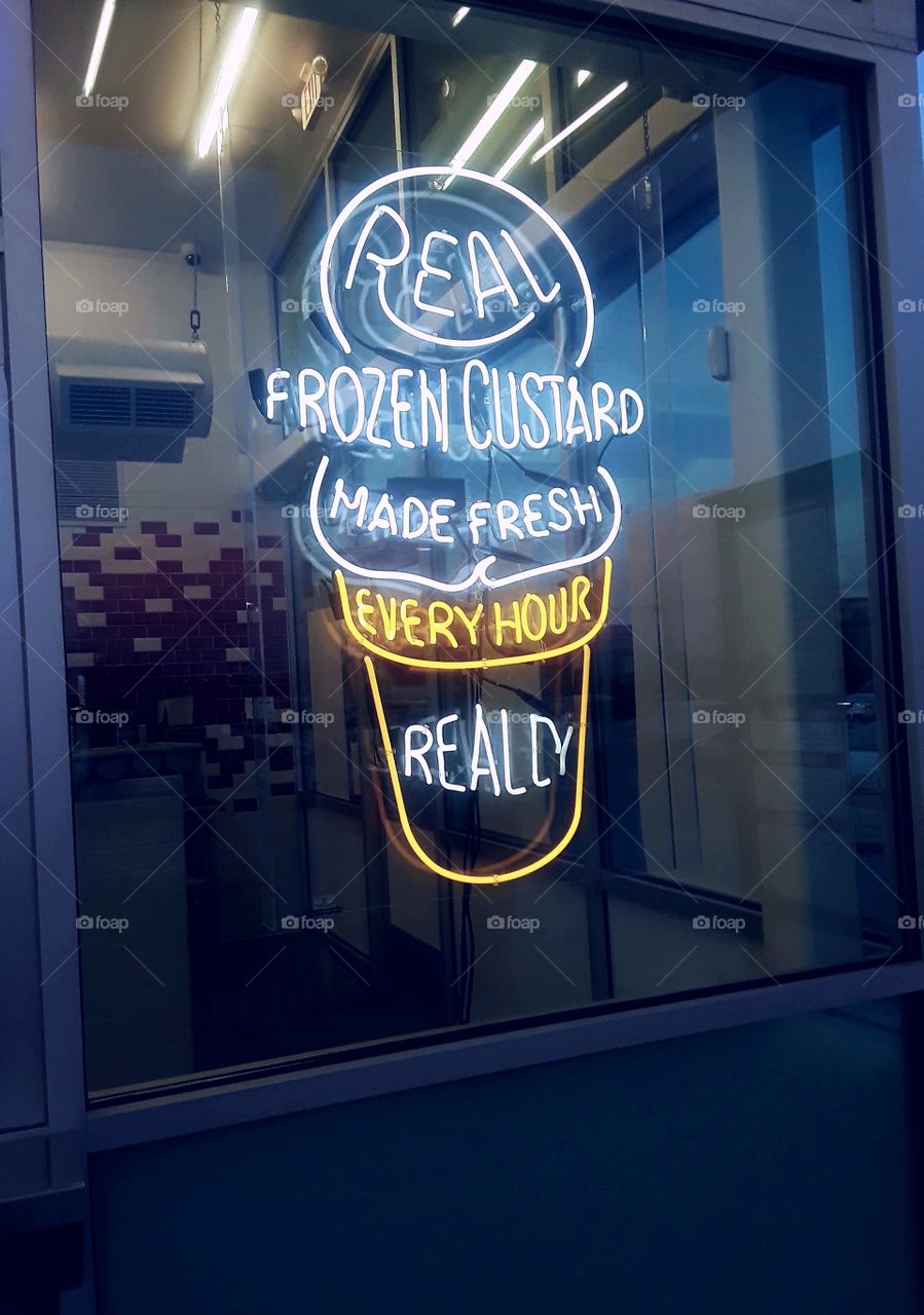 Icecream Store Neon Sign In Window