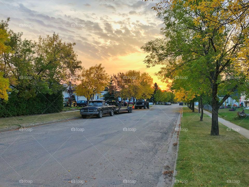 Sunrise down the street, Sunny day ahead, Fall is here in Canada, Strolling down the street, Beautiful sunrise, peaceful community, hdr via celfone, iphone photography, nnphotos, instagrammable picture, Canada mornings are the best