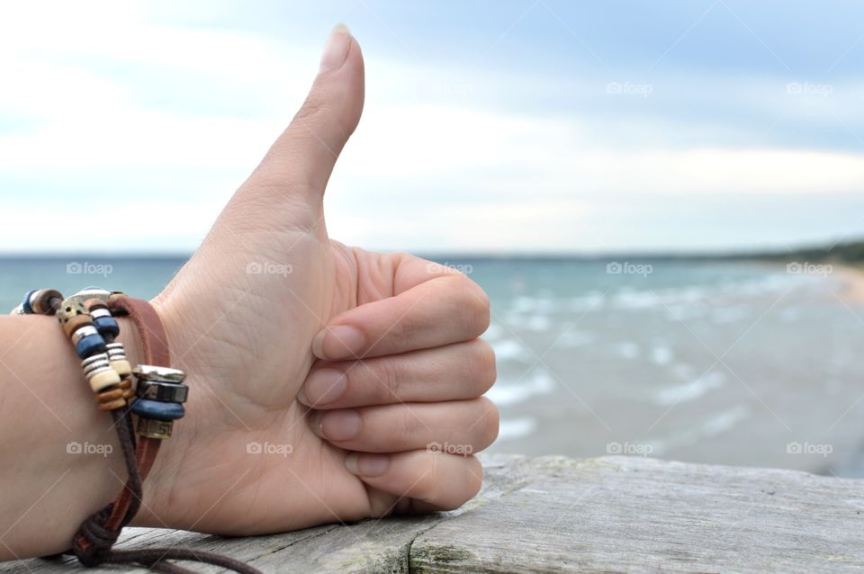 Thumbs up to the beach 