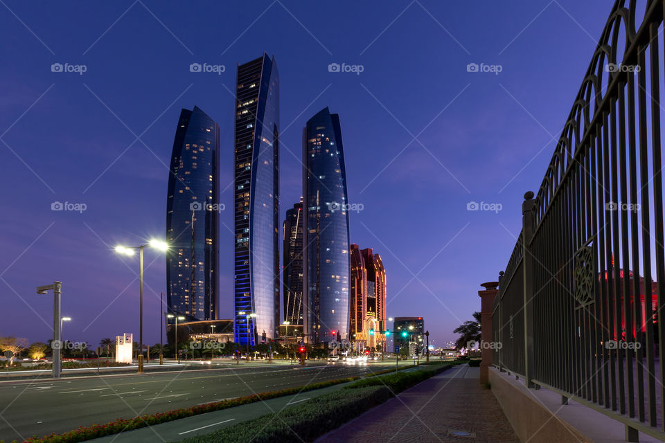 Modern high rise towers in Abu Dhabi, UAE during blue hour