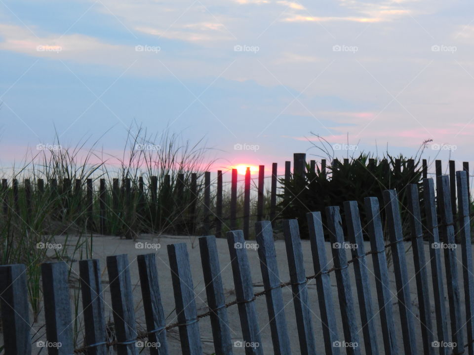 Dewey beach Maryland fence sunrise