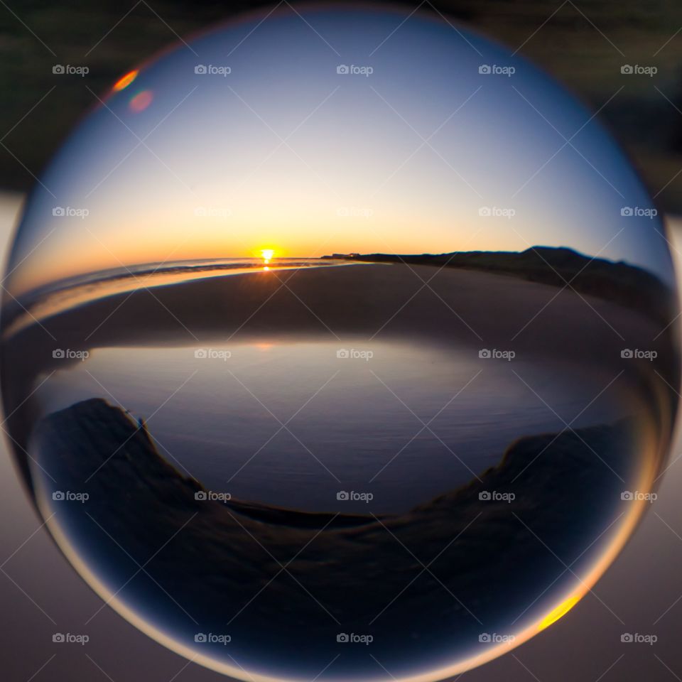 sunrise through a lens ball in Hartlepool, England