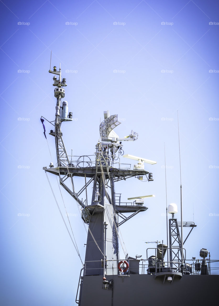 Radar on battleship and blue sky background