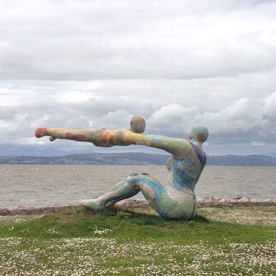  Sculpture  by the Sea. Colourful sculpture on Morecambe sea, mother and child.  