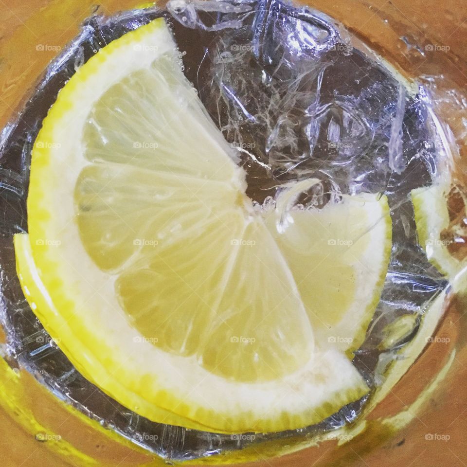 Gordons gin and tonic with a slice of lemon 