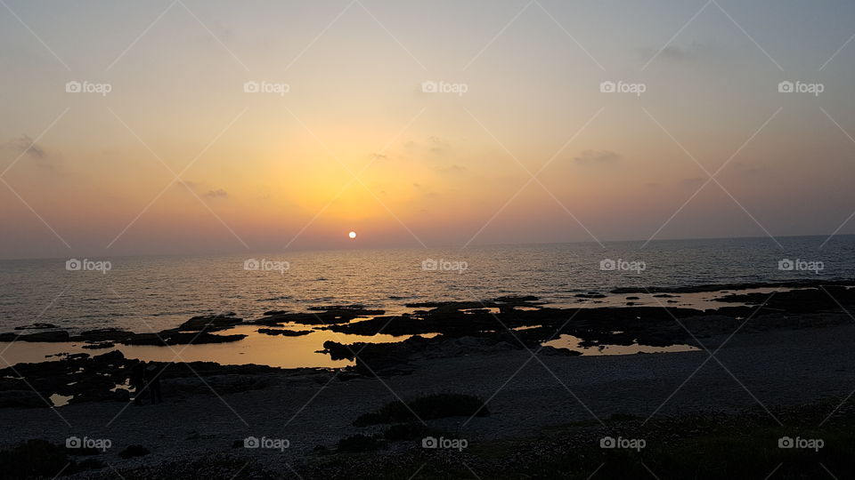 sunset on the beach of haifa