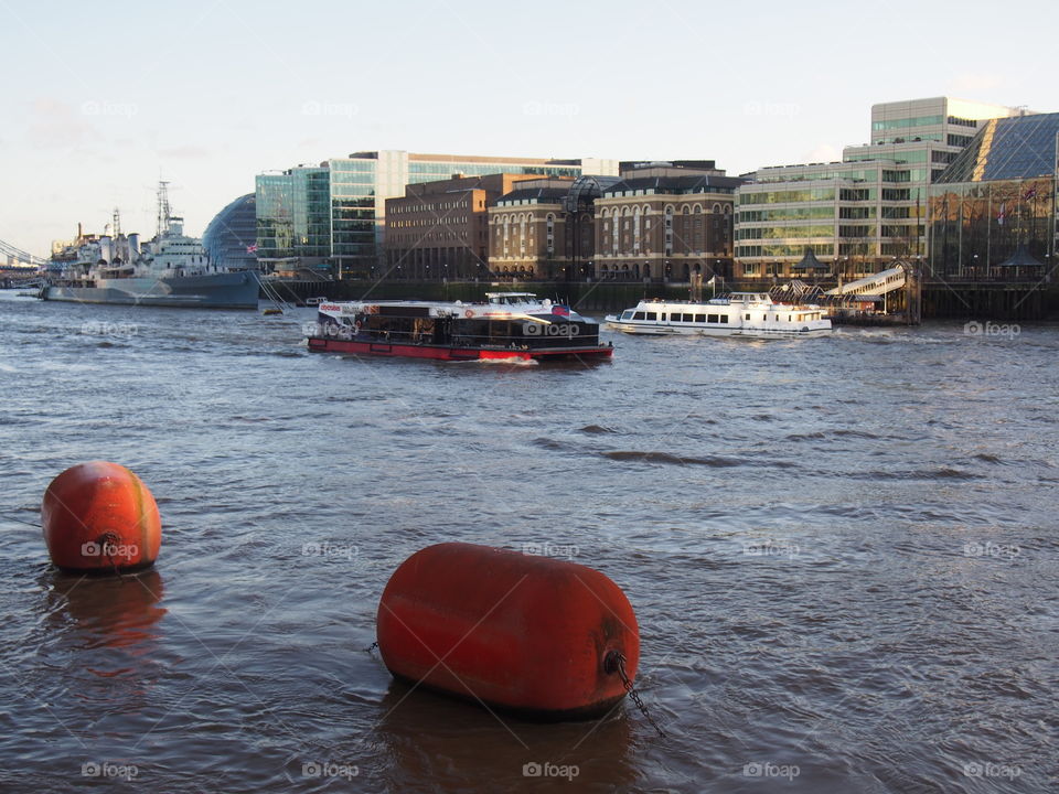 Buoys and boats on the Thames