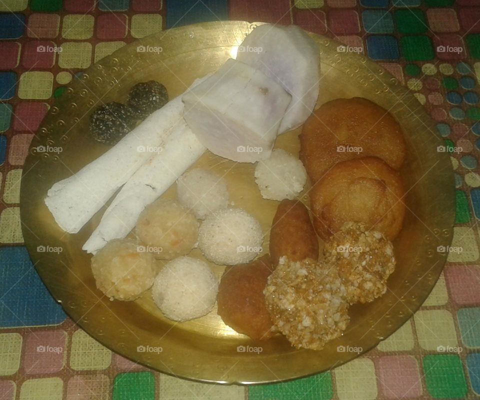 I am always hungry Til pitha, Narikolor ladu of Assam