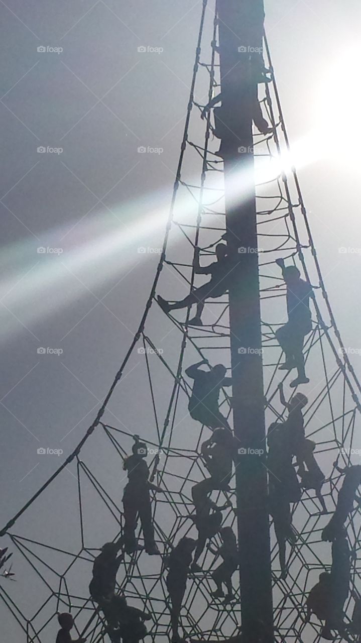 Climbing Silhouettes. Riverview park in Mesa, AZ