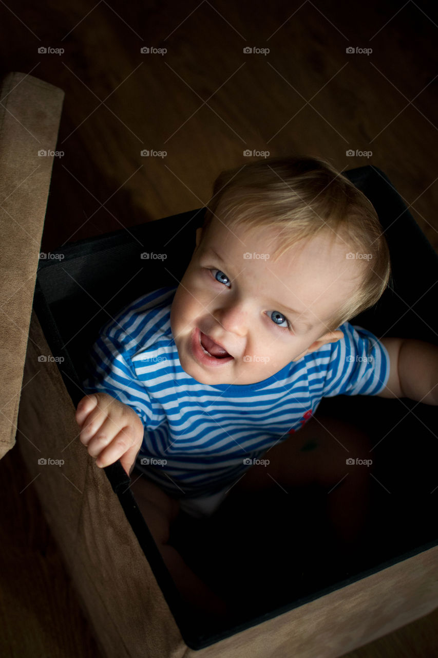 my son. he loves to sit in boxes