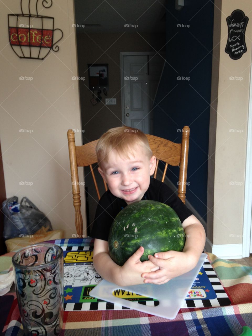 Cuteness overload . The boy loves fruit! 