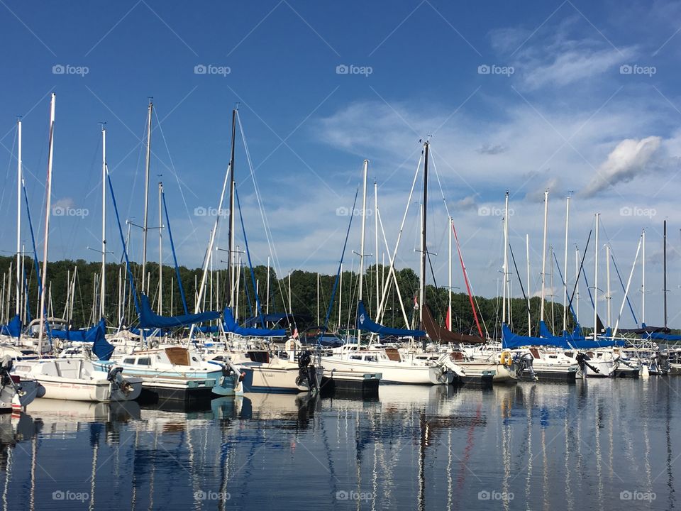 Sail boats docked at the pier