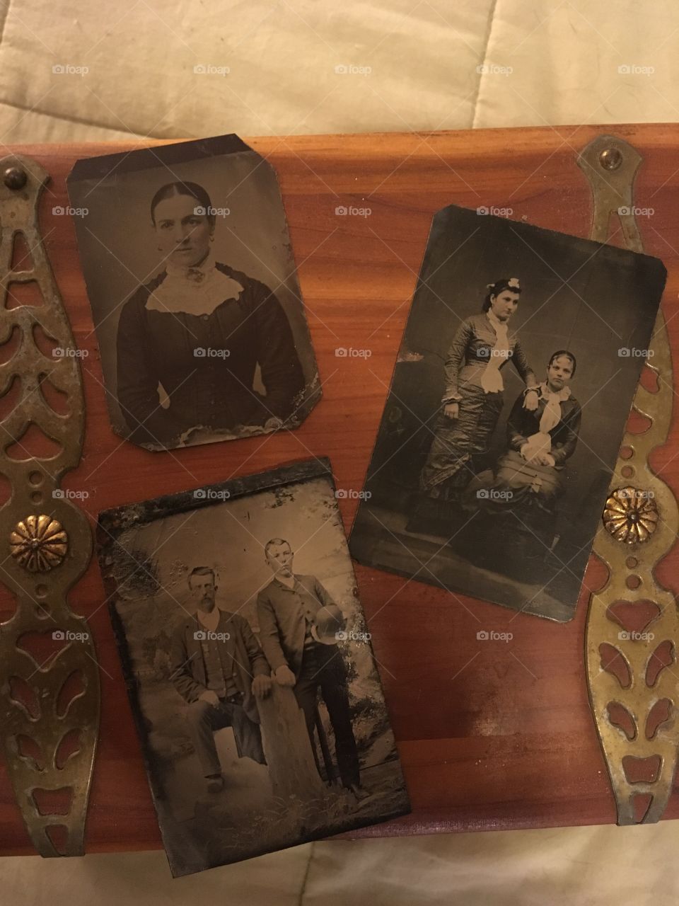 A grouping of old tin type photographs from an old estate sale. 