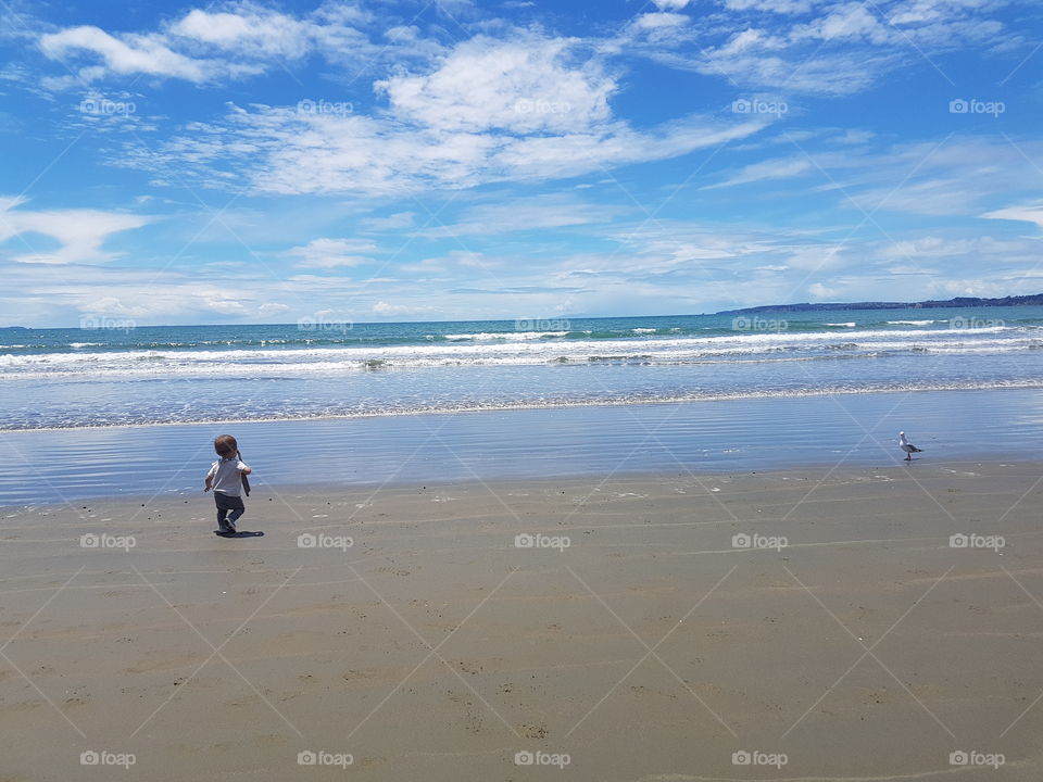 toddler at the beach in New Zealand