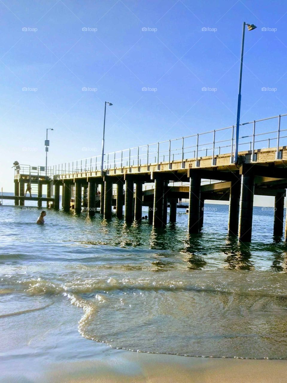 Pier over sea against sky