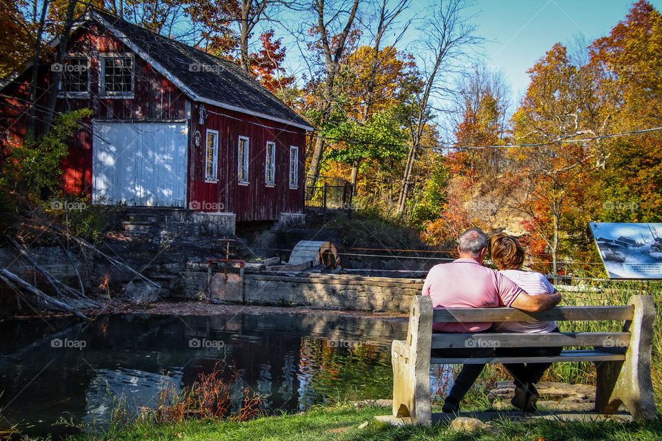 Senior couple on a bench in a picturesque place