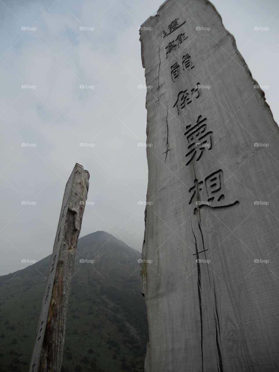 The Heart Sutra carved on wooden posts surrounding the "Big Buddha" (Tian Tan Buddha)  on Lantau  Hong Kong