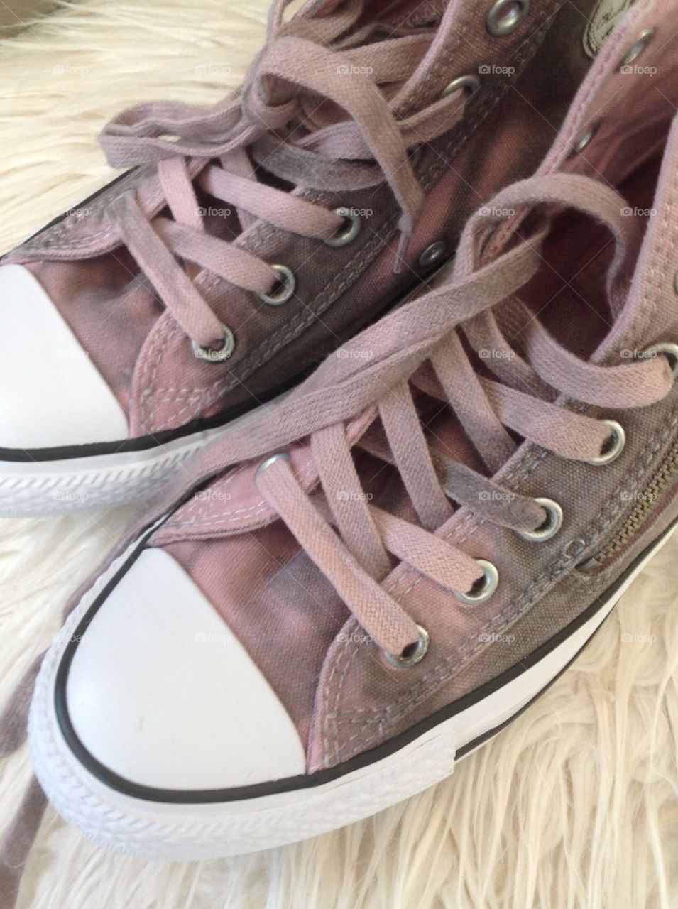 Lavender color sneakers with zippers for a fashionable statement.