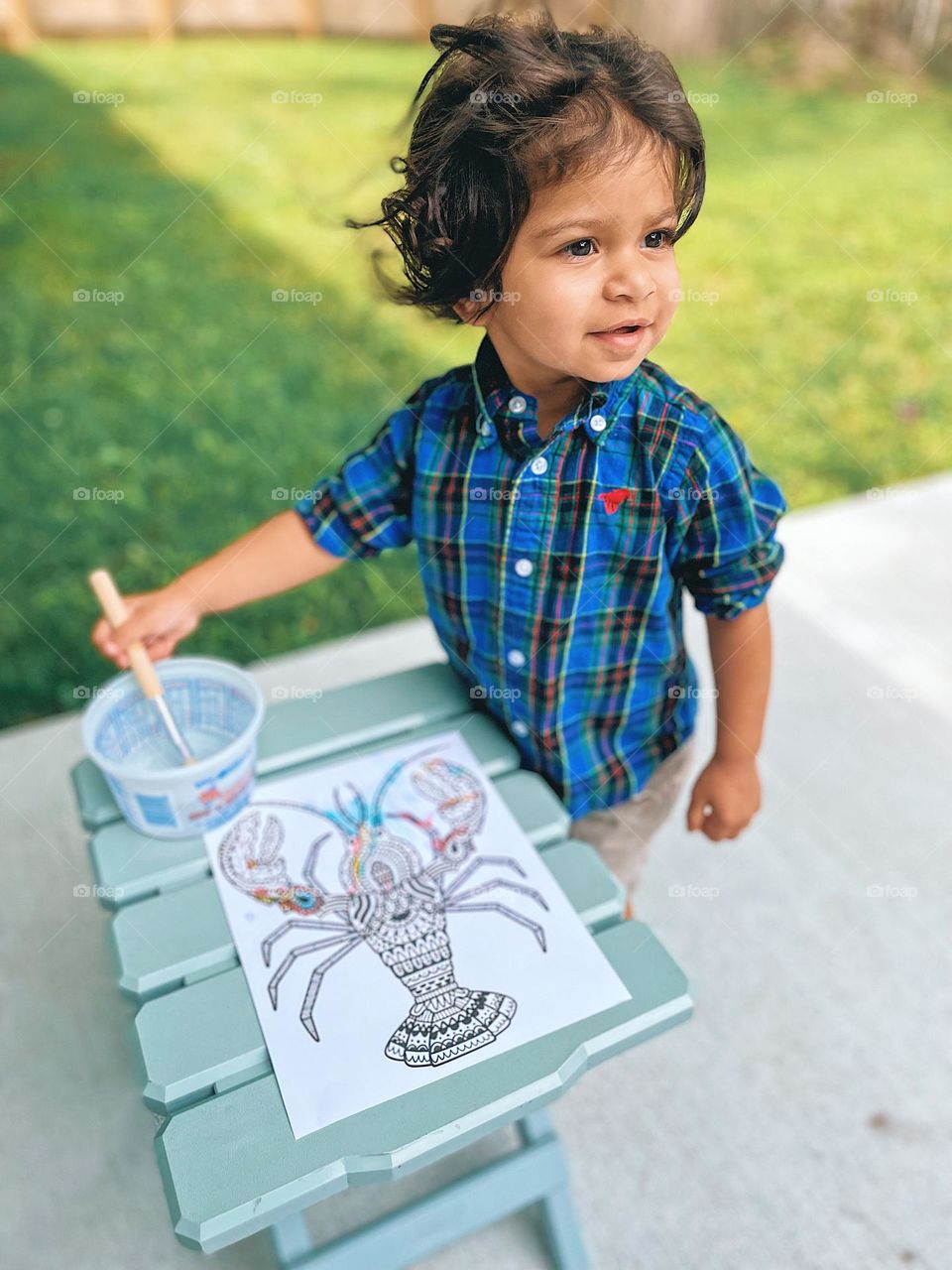 Toddler painting outside, toddler painting a lobster, arts and crafts with a toddler, creative projects with toddlers