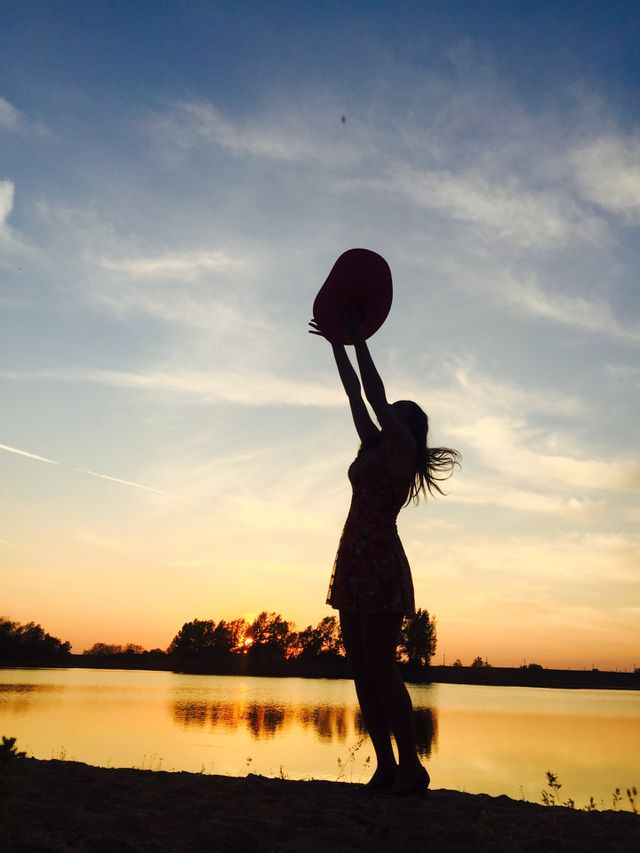 Silhouette of woman in the sunset