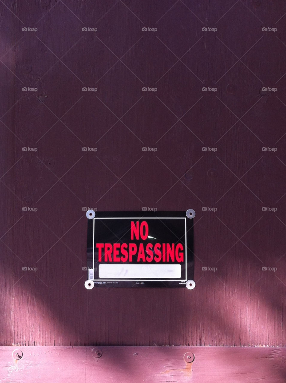 sign no treapassing by monolith