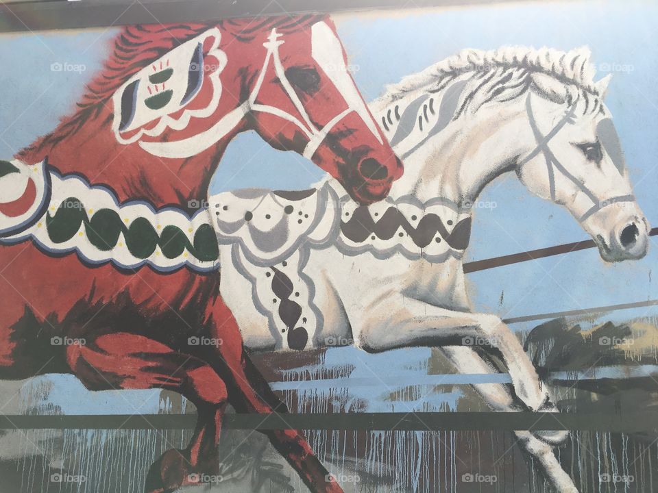 Horses painting on a wall