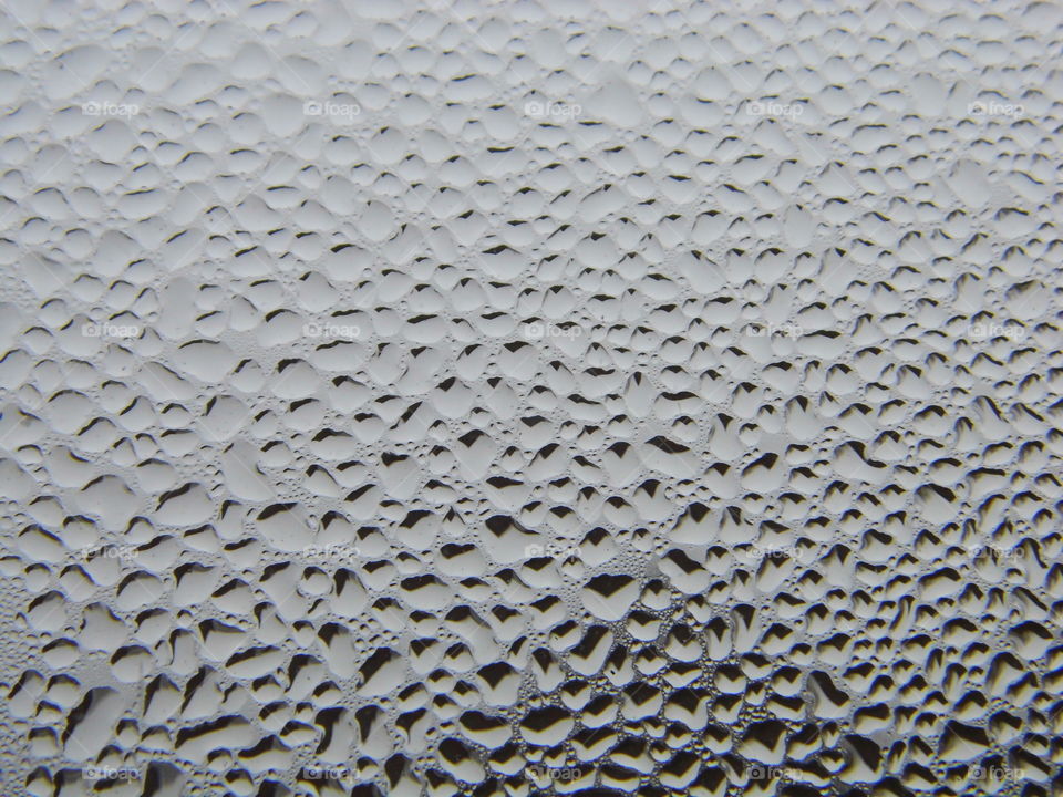 Water drops on window glass after rain
