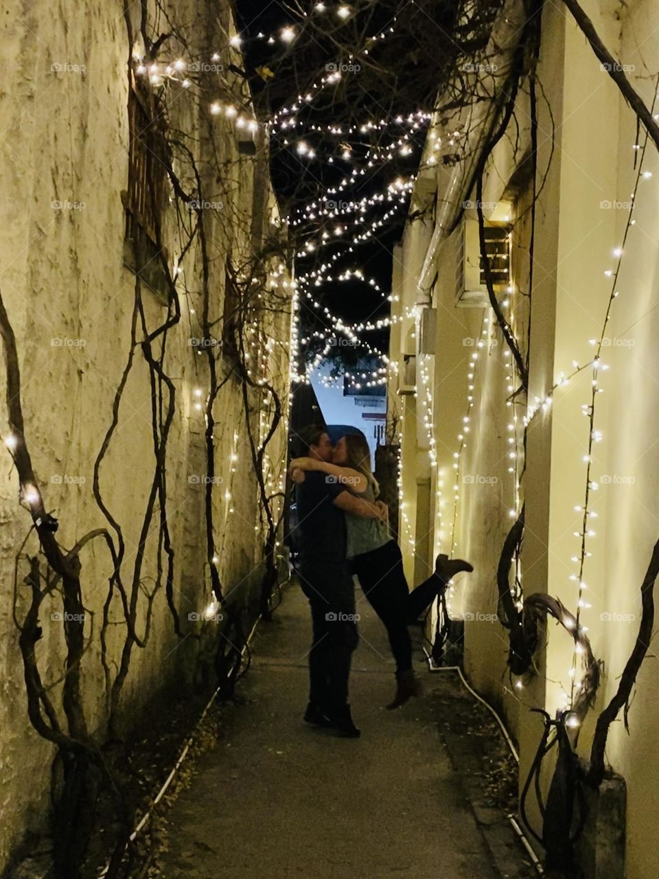 So In Love! Kissing in a romantic alley under the lights and stars 