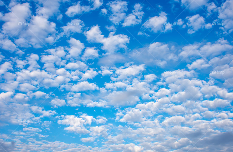 The beauty of the sky with clouds and the sun.