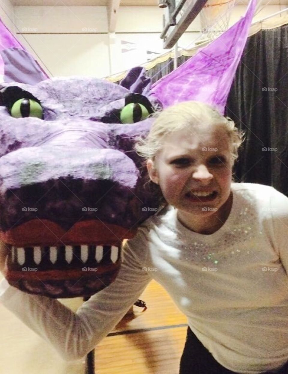 Lil’ poser with dragon from Shrek musical and her Junior high. She was a Duloc.