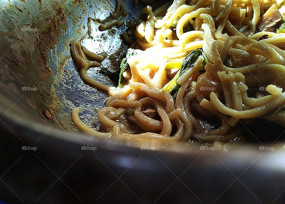 Fried noodles on the pan