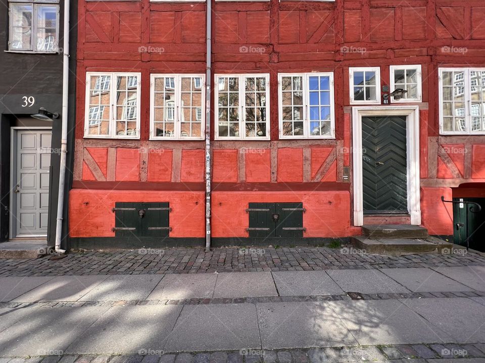 Red facade in a street in Copenhagen downtown 