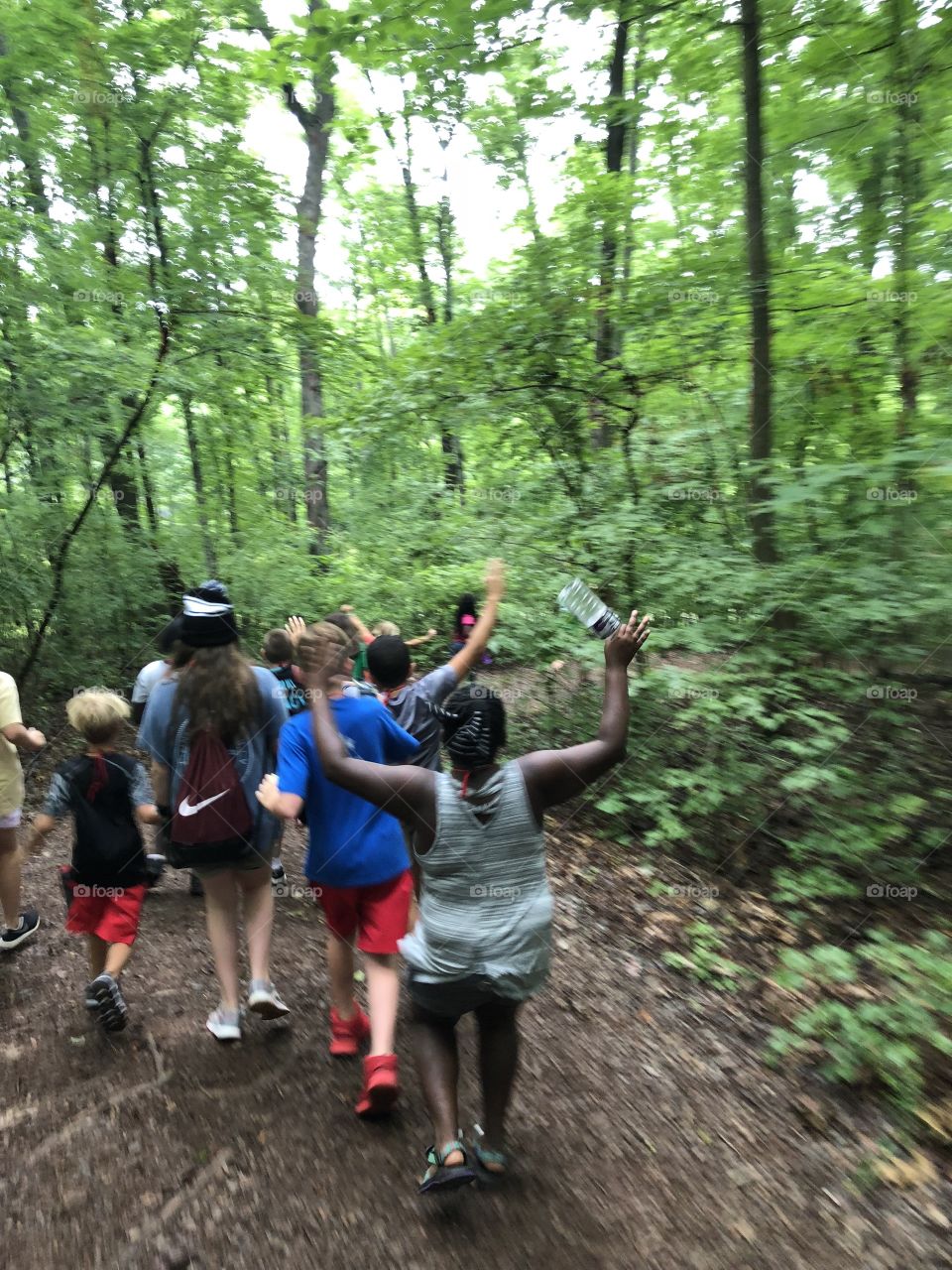taking kids on a hike for June summer fun