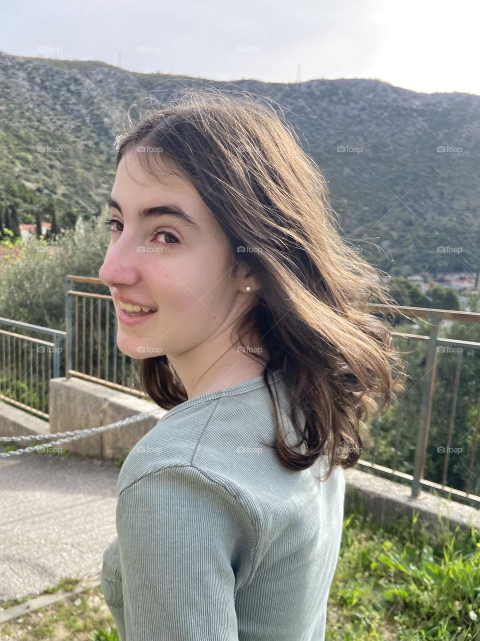 Enjoying a warm spring day as a young preteen with the anticipation of summer around the corner.