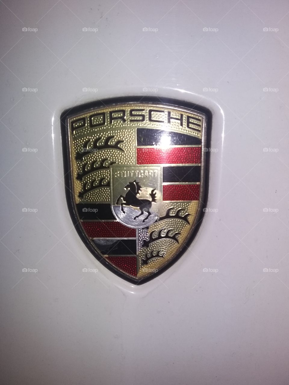 Porsche logo with white paint