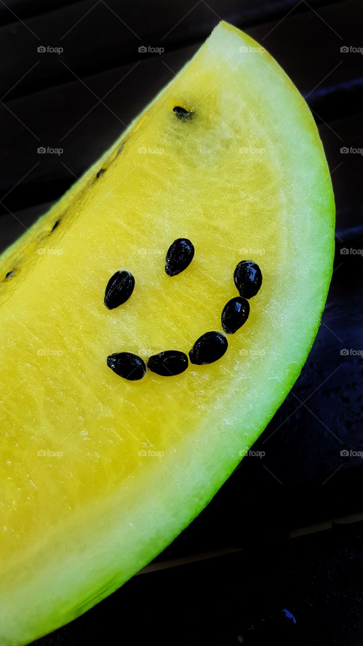 happy smile watermelon. From a smile the gloomy day is brighter