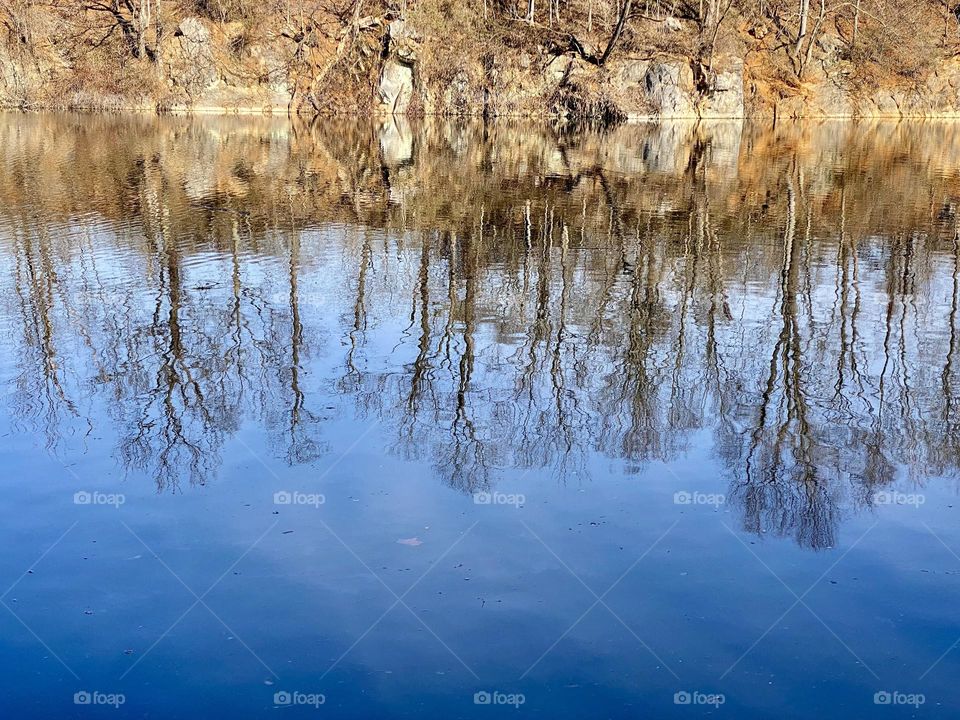 Reflections in a lake at an old quarry