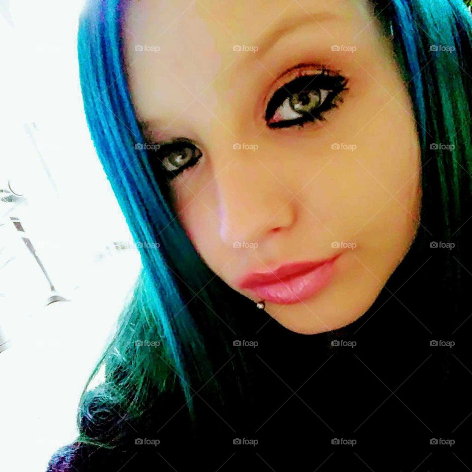 this is a close up of me when I blue hair and my lip peirced.