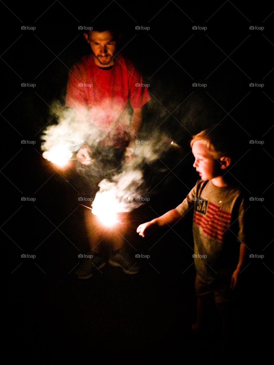 Fireworks and a boy 
