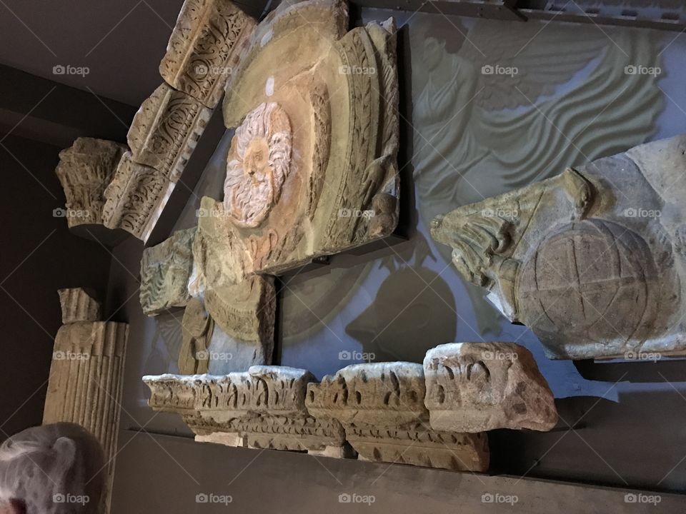 What remains of a temple facade is met with a modern projection to complete the image.