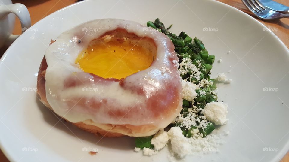Breakfast at Char. Amazing brioche toast with egg yolk, gruyère, and asparagus at Char-cu-te-rie in Visalia, Calif.