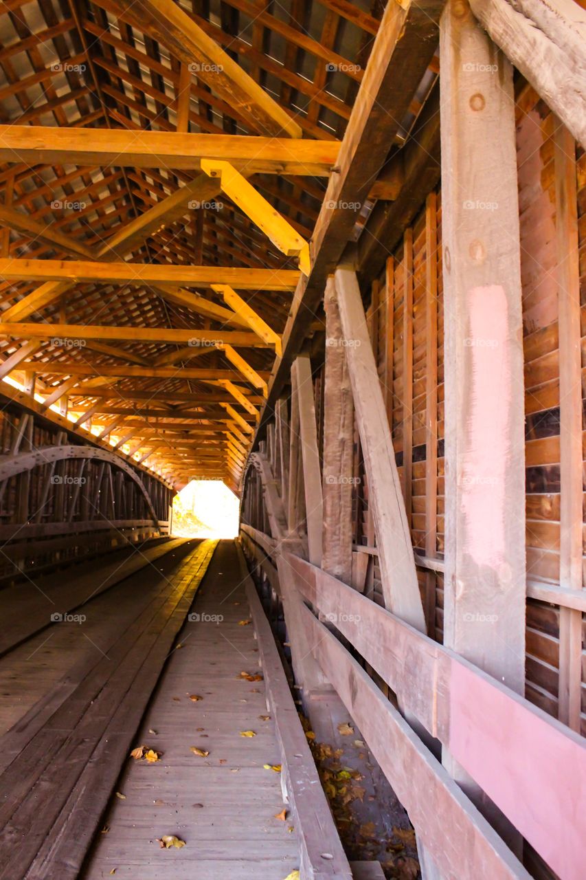 Tunnel through a covered bridge in the Autumn