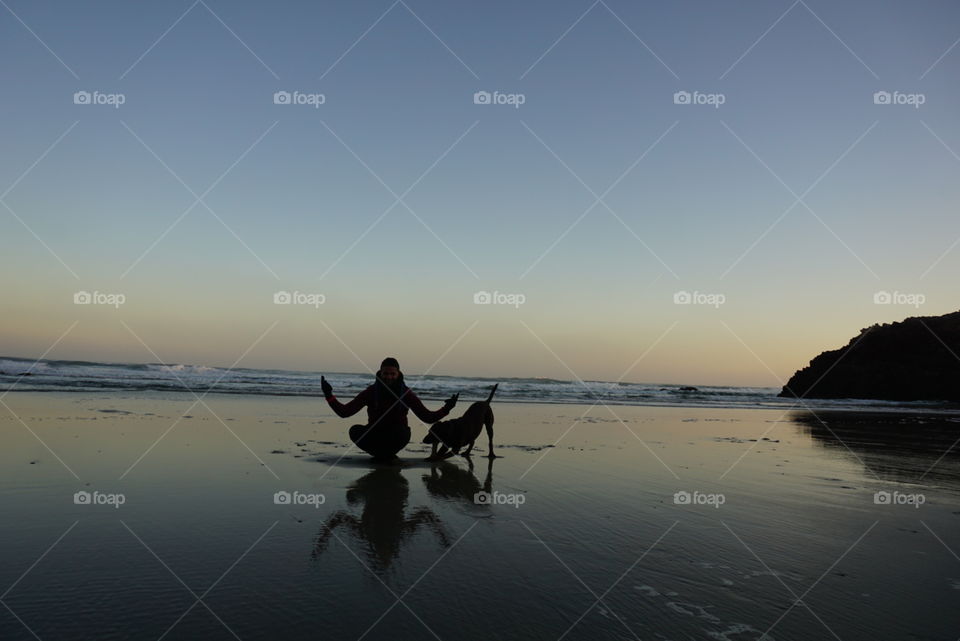 Beach#sunset#reflect#human#dog#ocean#sky