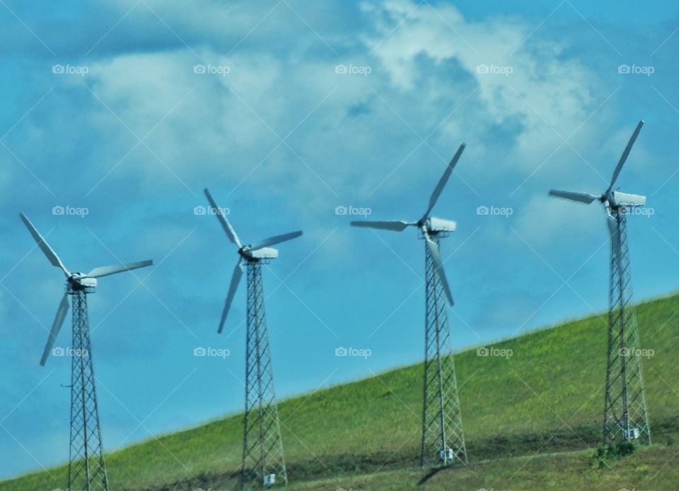 Green Wind Power. Installation Of Wind Power Turbines Generating Clean Sustainable Electricity
